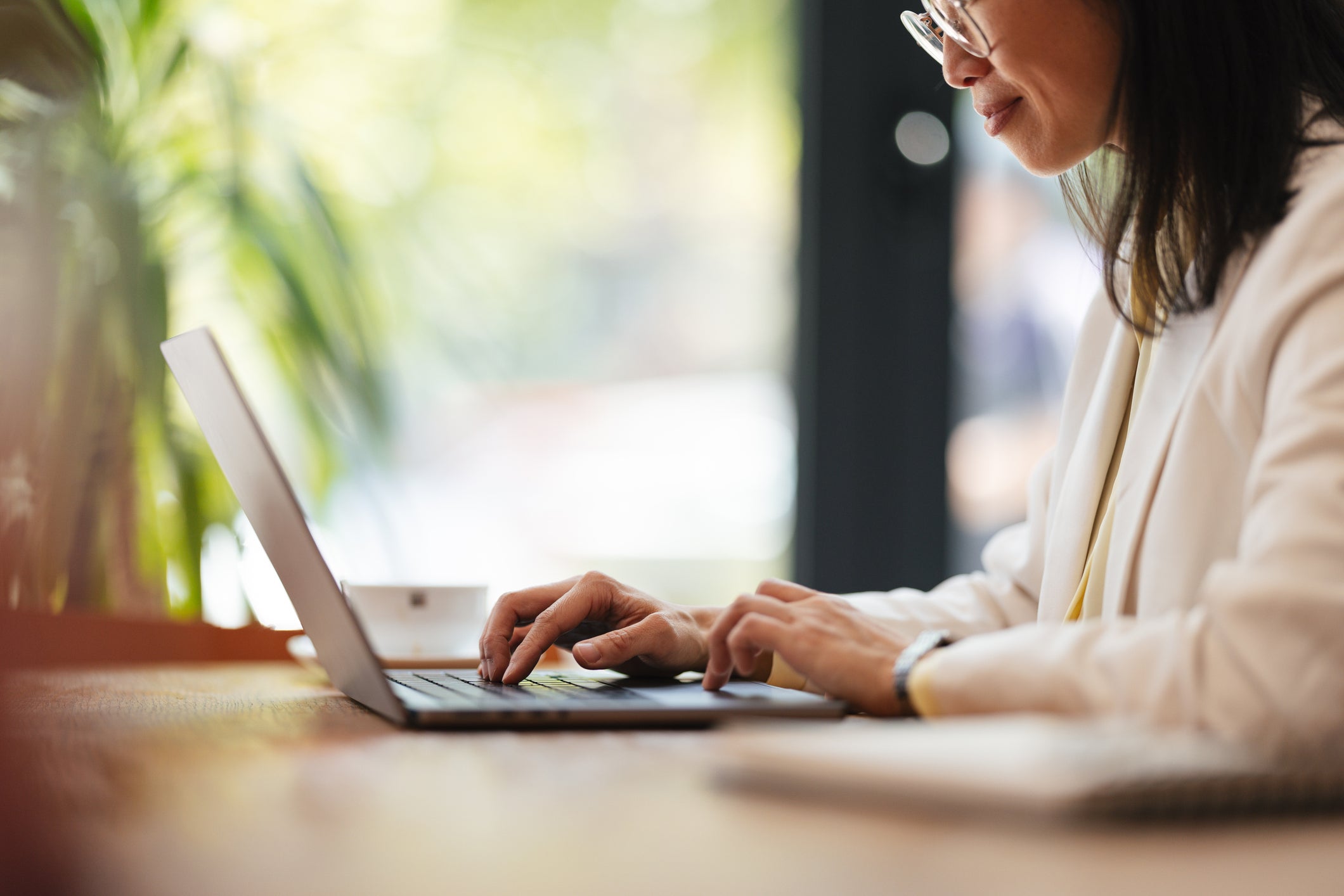 Person looking at laptop screen. 
